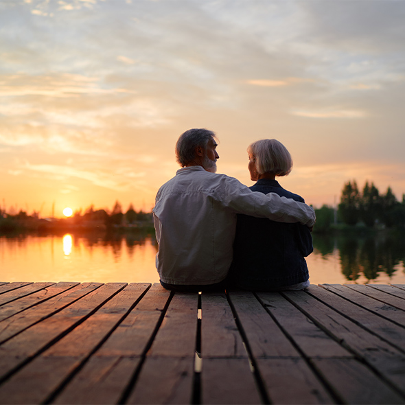 couple sitting on dock