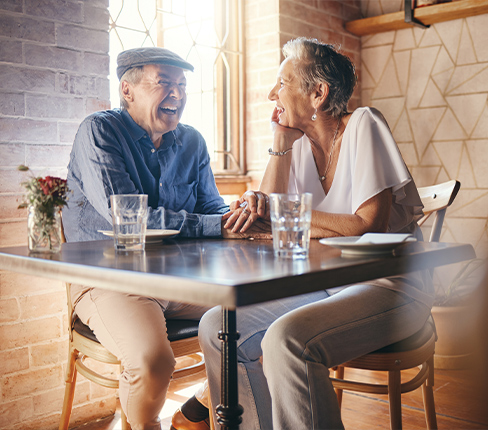 retired couple at educational seminar about successful retirement strategies
